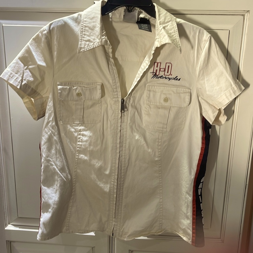 Cream colored, zip up Harley Davidson shirt size extra large